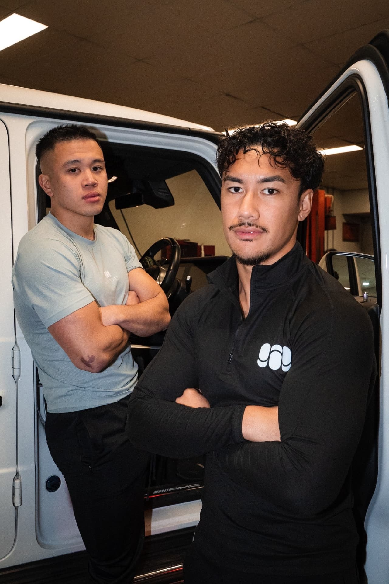 Flowstate Department campaign, two men by a white G-Wagon